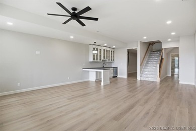 Experience elevated lake living in this new construction villa - photo 37