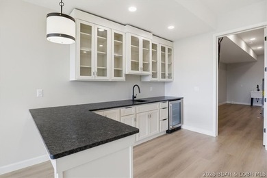 Experience elevated lake living in this new construction villa - photo 39
