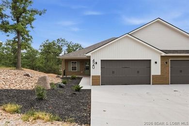 Experience elevated lake living in this new construction villa - photo 41