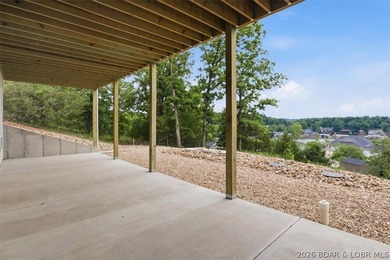 Experience elevated lake living in this new construction villa - photo 42