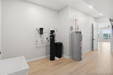 Experience elevated lake living in this new construction villa - photo 43