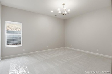 Experience elevated lake living in this new construction villa - photo 46