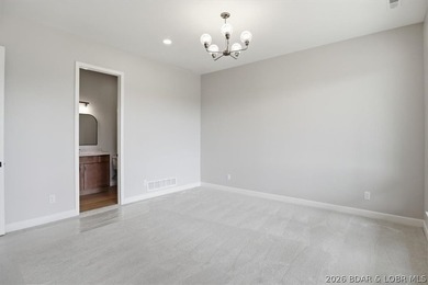 Experience elevated lake living in this new construction villa - photo 47