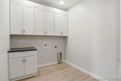 Experience elevated lake living in this new construction villa - photo 49