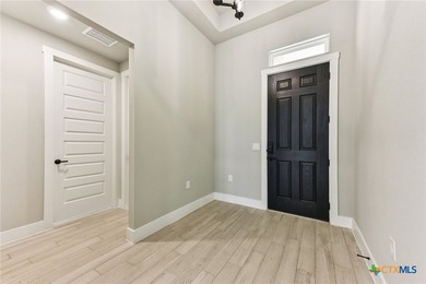 Auburn Plan with upgraded kitchen, quartz countertops, dry bar - photo 4