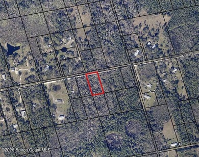 1.22-acre wooded lot located on a quiet dirt road, offering a - photo 1