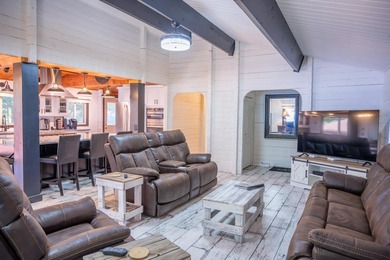 Enjoy 100 feet of owned frontage on Castle Rock Lake with this - photo 11