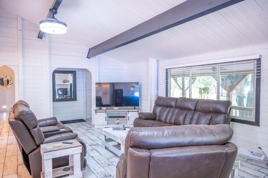 Enjoy 100 feet of owned frontage on Castle Rock Lake with this - photo 13