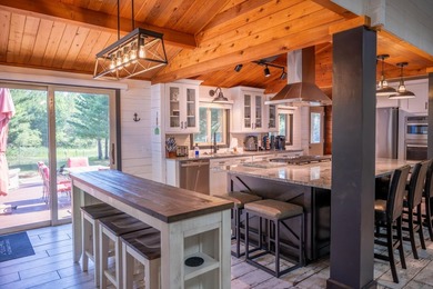 Enjoy 100 feet of owned frontage on Castle Rock Lake with this - photo 14