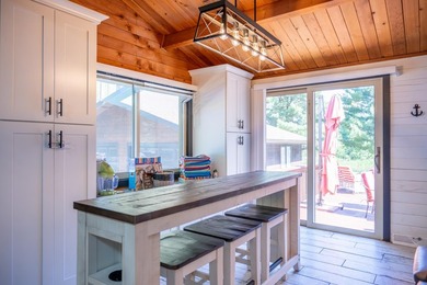 Enjoy 100 feet of owned frontage on Castle Rock Lake with this - photo 18