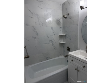 This totally updated condo in Stamford's Springdale neighborhood - photo 6