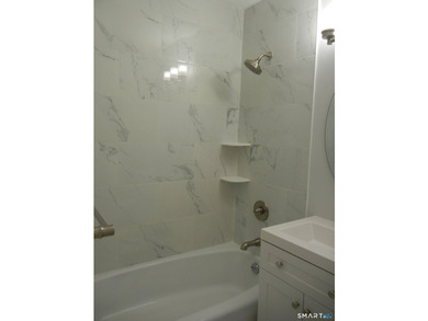 This totally updated condo in Stamford's Springdale neighborhood - photo 8