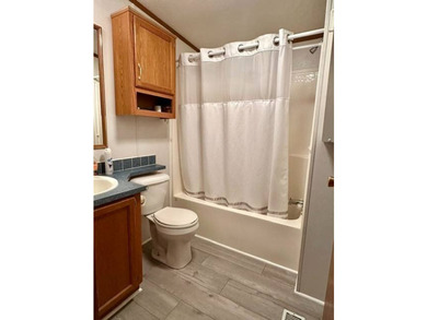 Tucked away in a 1 acre +/- wooded setting, this 3 bedroom - photo 11