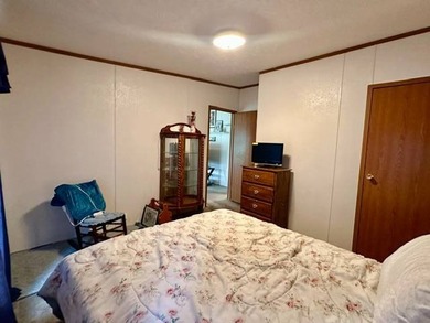 Tucked away in a 1 acre +/- wooded setting, this 3 bedroom - photo 15