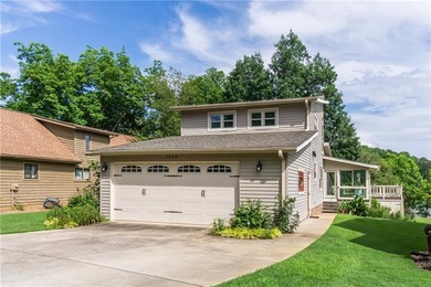 Enjoy lake living at its best in this updated home featuring - photo 3