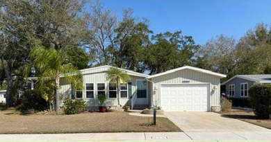 Centrally located, this bright & sunny 2BD/2BA home offers an - photo 1