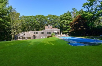 Perfectly situated on an acre in the heart of Water Mill, this - photo 1
