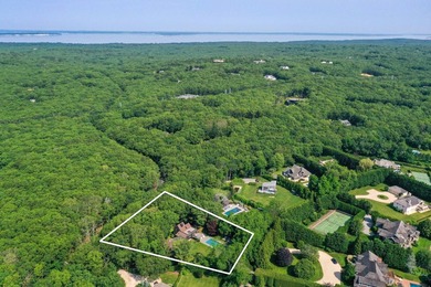 Perfectly situated on an acre in the heart of Water Mill, this - photo 2