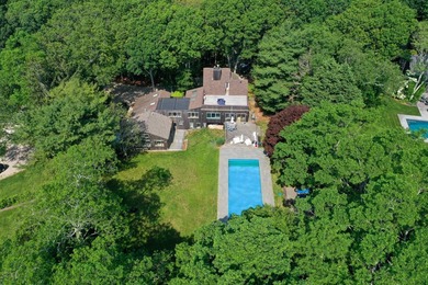 Perfectly situated on an acre in the heart of Water Mill, this - photo 3