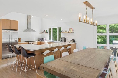 Perfectly situated on an acre in the heart of Water Mill, this - photo 5