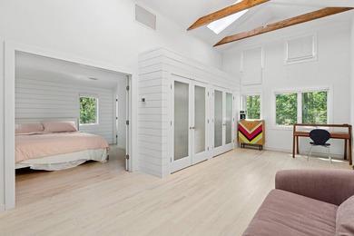 Perfectly situated on an acre in the heart of Water Mill, this - photo 7