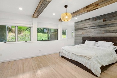 Perfectly situated on an acre in the heart of Water Mill, this - photo 8