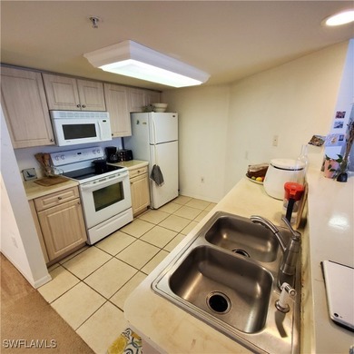 Nice end unit on 1st floor (so no steps to climb with your - photo 9