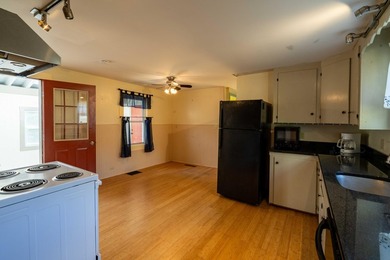Originally built in 1850, this thoughtfully maintained farmhouse - photo 17