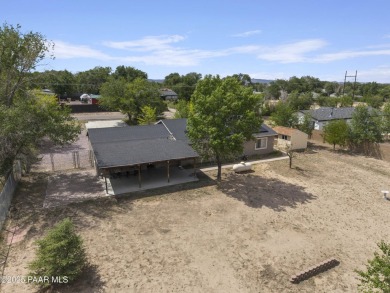 The home is centrally located in the quiet neighborhood of Chino