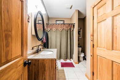 Stunning 3 bedroom, 2.5 bath, 2,200 +/- square foot log home - photo 12