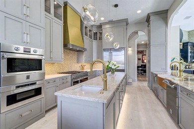 Experience an unparalleled waterfront lifestyle in this - photo 11