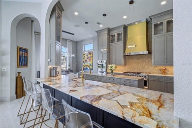 Experience an unparalleled waterfront lifestyle in this - photo 14