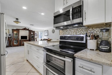 Step into this beautifully updated 3 bedroom, 2 bathroom home in - photo 16