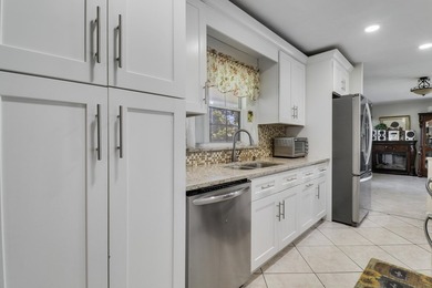 Step into this beautifully updated 3 bedroom, 2 bathroom home in - photo 17