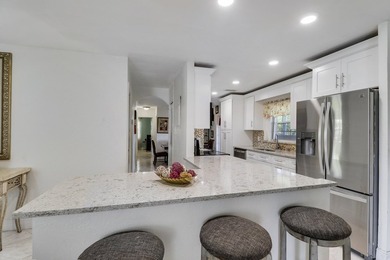 Step into this beautifully updated 3 bedroom, 2 bathroom home in - photo 18