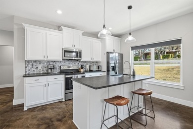 Turn-key lake house + proven short-term rental investment in the - photo 5