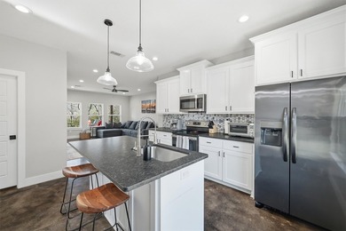 Turn-key lake house + proven short-term rental investment in the - photo 6