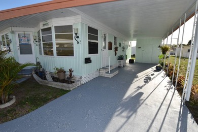 Charming 2-bedroom, 1.5-bath cottage-style mobile home located - photo 2