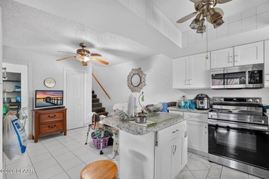 Pond views, a remodeled kitchen, and plenty of upside. This - photo 12