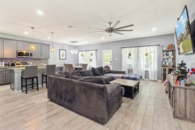 Welcome home to this gorgeous 4-bedroom, 2-bath residence that - photo 12