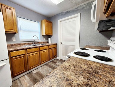 Sturdy block home which has been completely remodeled including - photo 12