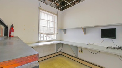 The property includes a spacious building, featuring both - photo 17