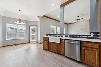 Located in a quiet cul-de-sac within a gated community, this