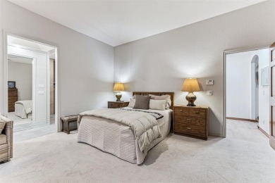 Located in a quiet cul-de-sac within a gated community, this