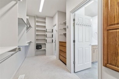 Located in a quiet cul-de-sac within a gated community, this