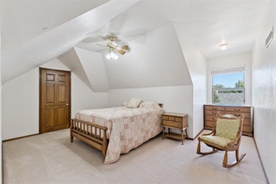 Located in a quiet cul-de-sac within a gated community, this