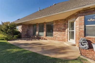 Located in a quiet cul-de-sac within a gated community, this