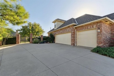 Located in a quiet cul-de-sac within a gated community, this