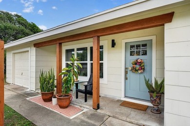 Just three blocks from Aransas Bay, this beautifully updated - photo 1