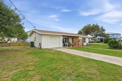Just three blocks from Aransas Bay, this beautifully updated - photo 3